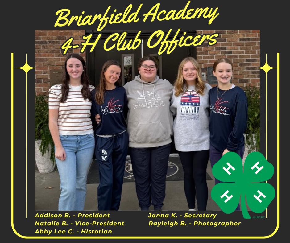 Briarfield Academy 4-H Club Officers. 4-H Emblem logo. Five girls posing for a photo.